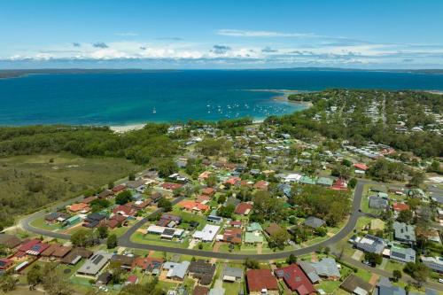 an aerial view of a town next to the ocean at Dolphin Cove - Pet Friendly with Fireplace in Callala Bay