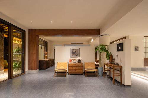 Χώρος καθιστικού στο Jiuhuashan Zuowangshanli Hotel