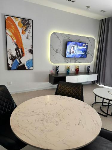 TV o dispositivi per l'intrattenimento presso CSJ Seaside - Căn Hộ Cạnh Biển
