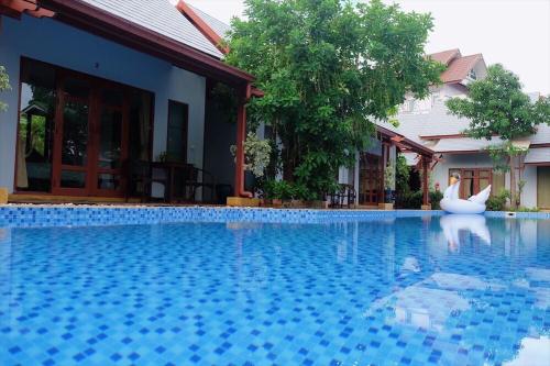 Bazén v ubytování Ardea Resort Pool Villa nebo v jeho okolí