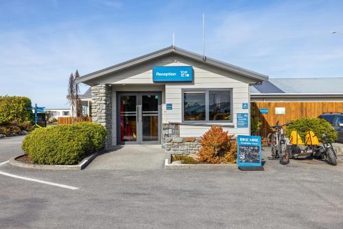 a store with a sign in front of it at Kaikōura TOP 10 Holiday Park in Kaikoura