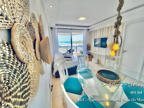 Khu vực ghế ngồi tại Férias com Vista Mar - Beach Village Residence por Casamarinn