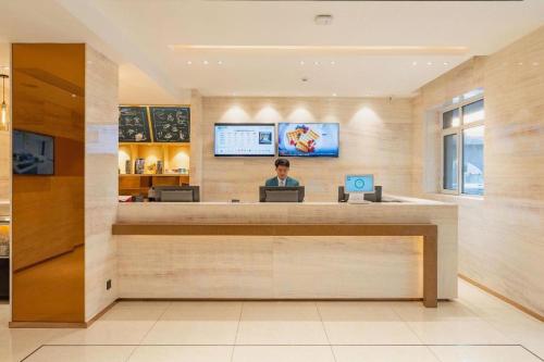 TV o dispositivi per l'intrattenimento presso City Comfort Inn Jinan West Station Shandong International Convention and Exhibition