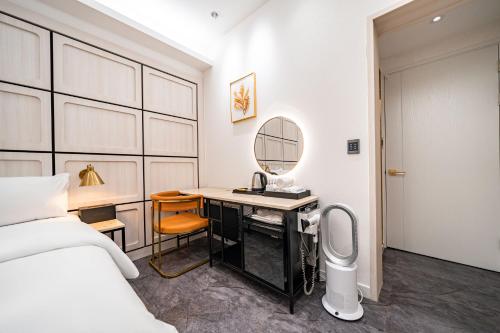 Cama o camas de una habitación en HotelInsta Main Branch
