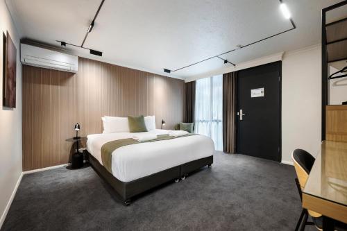 Кровать или кровати в номере Innova Motel Warrnambool