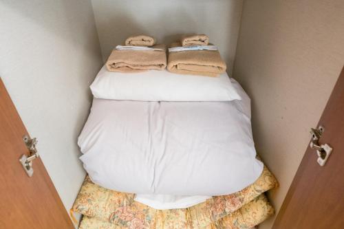 En eller flere senge i et værelse på Shinjuku-ku - House / Vacation STAY 3185