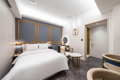 Cama o camas de una habitación en HotelInsta Main Branch