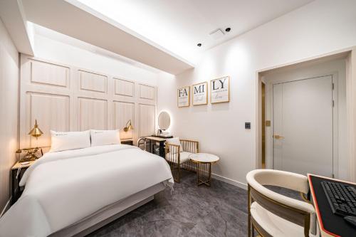 Cama o camas de una habitación en HotelInsta Main Branch