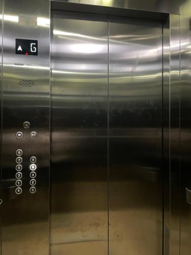 an elevator door with the letter g on it at Noble Haven in Thika