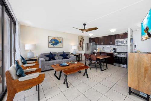 a living room with a couch and a table at 34FL Deluxe Living in Waikiki - Ocean View Condo with Parking in Honolulu