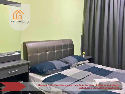 a bedroom with a bed with a gray headboard at Cozy Apartment for Two - KANVAS SOHO Cyberjaya in Cyberjaya