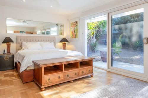 Ένα ή περισσότερα κρεβάτια σε δωμάτιο στο White Lotus