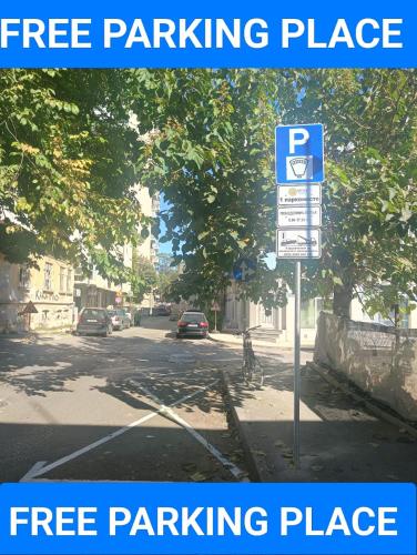 a free parking place sign on a city street at MDM APARTMENT CITY CENTER in Ruse
