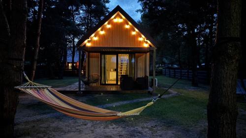 Osada pod Gwiazdami Łasko & SPA - Deluxe, ogrodzony, JEZIORA, ognisko, taras, dodatkowa sypialnia, Plaża, KAJAKI, dostępna SAUNA i JACUZZI