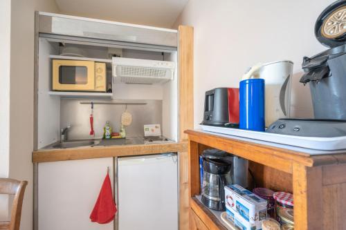 Una cocina o zona de cocina en Gai Réveil - Les Capucines