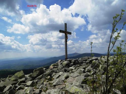 a wooden cross on top of a mountain at Inviting apartment in Freyung with sauna & indoor pool in Freyung