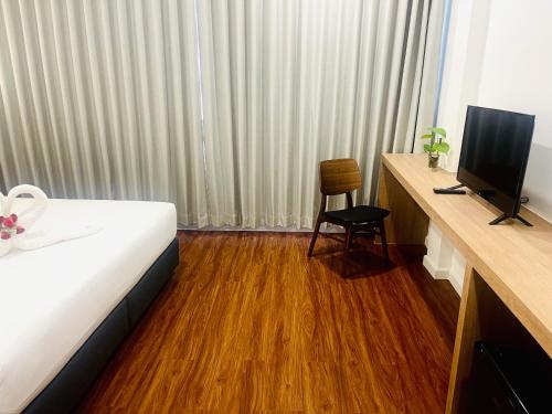 TV a/nebo společenská místnost v ubytování S2S Queen Trang Hotel