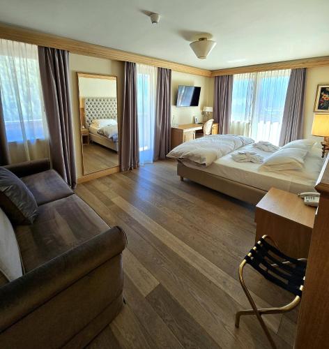 Postel nebo postele na pokoji v ubytování Hotel Lorenzetti