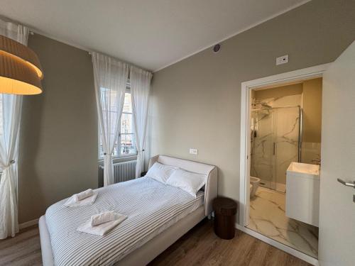 Postel nebo postele na pokoji v ubytování Pep's Rooms by the sea