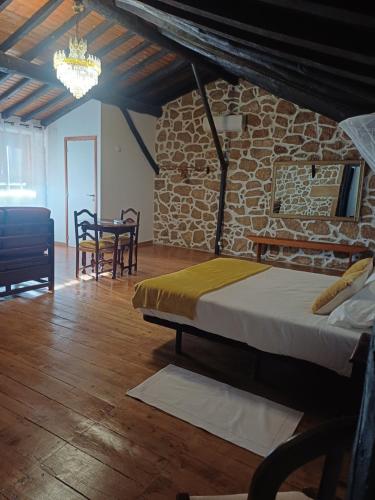 Postel nebo postele na pokoji v ubytování Monte da Fonte Santa de São Luís