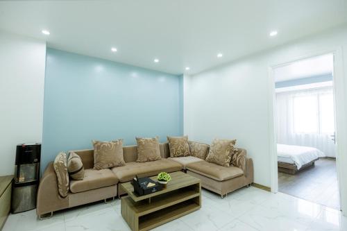 Posezení v ubytování TQ5 Hotel & Apartment