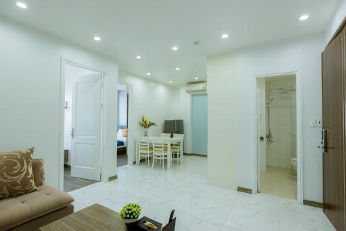 TV a/nebo společenská místnost v ubytování TQ5 Hotel & Apartment