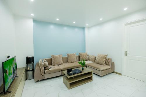 Posezení v ubytování TQ5 Hotel & Apartment