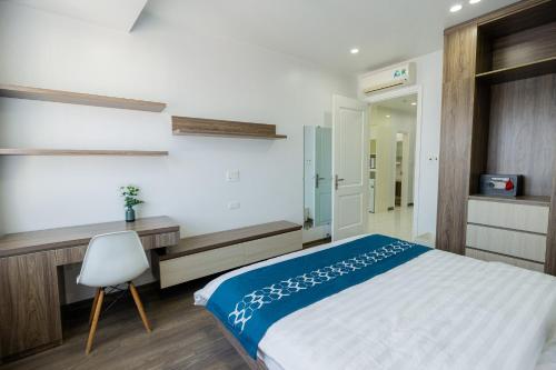 Postel nebo postele na pokoji v ubytování TQ5 Hotel & Apartment