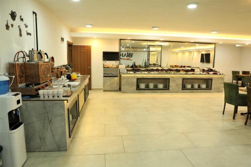 Cucina o angolo cottura di Bianca Hotel VAN