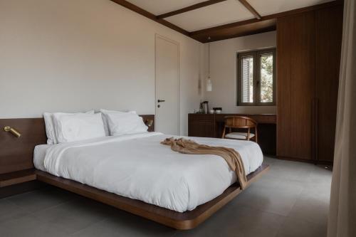 Letto o letti in una camera di Amphitheatro Boutique Hotel