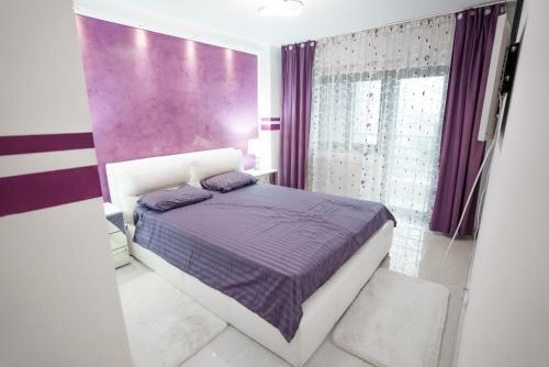 Ένα ή περισσότερα κρεβάτια σε δωμάτιο στο Apartament Luxury - Promenada