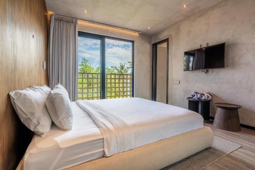 Ένα ή περισσότερα κρεβάτια σε δωμάτιο στο Jungle Vista Hotel Ubud Bali