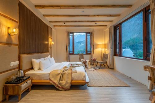 Ein Bett oder Betten in einem Zimmer der Unterkunft Tinan Khar