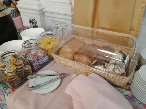 a basket of bread sitting on top of a table at Dom Zdrojowy w Szczawnie - Zdroju in Szczawno-Zdrój