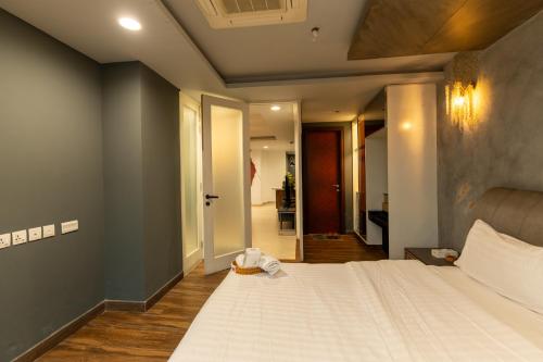 Gold Crest Luxury Hotel Apartments-City View DHA Lahoreにあるベッド