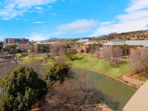 an aerial view of a park with a river at ANEW Hotel Roodepoort Johannesburg in Roodepoort