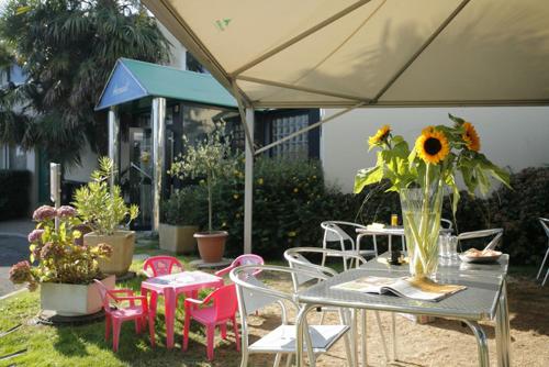 Κήπος έξω από το LIBERTY Hôtel Rennes Ouest