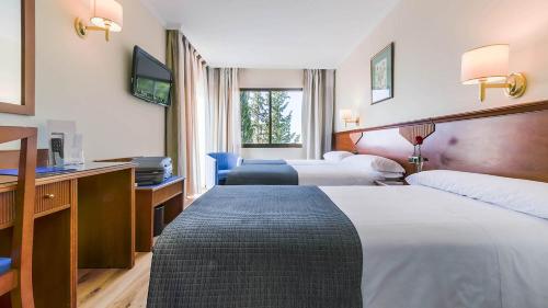 Postel nebo postele na pokoji v ubytování Hotel Varchu
