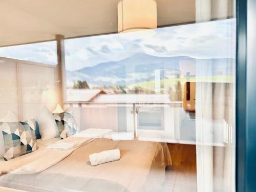 Nespecifikovaný výhled na hory nebo výhled na hory při pohledu z apartmánu