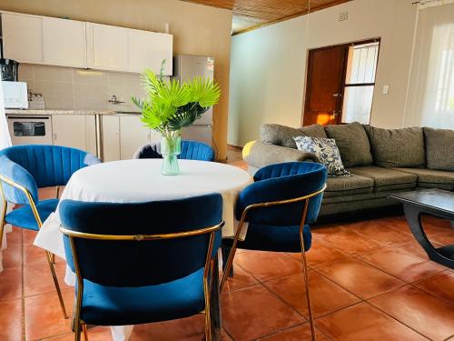 Kuchyň nebo kuchyňský kout v ubytování Genesis Homes