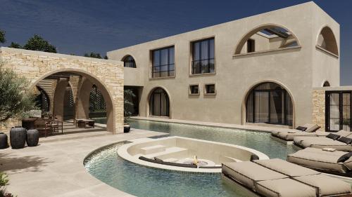 a house with a swimming pool with lounge chairs at 12 Islands Villas in Kolimbia