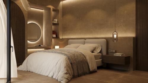 a bedroom with a white bed and a mirror at 12 Islands Villas in Kolimbia