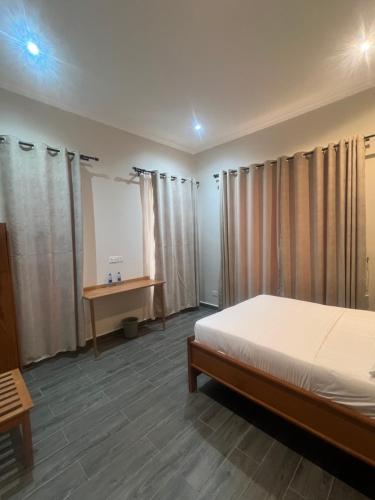 Ένα ή περισσότερα κρεβάτια σε δωμάτιο στο Evita Villas Lodge