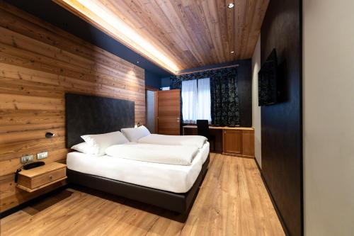 Letto o letti in una camera di Sport Hotel S. Vigilio