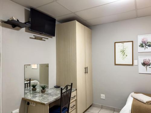 Kuchyň nebo kuchyňský kout v ubytování Padlangs Self-catering flats