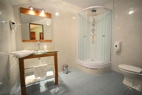 Kylpyhuone majoituspaikassa Central Hotel Cayenne