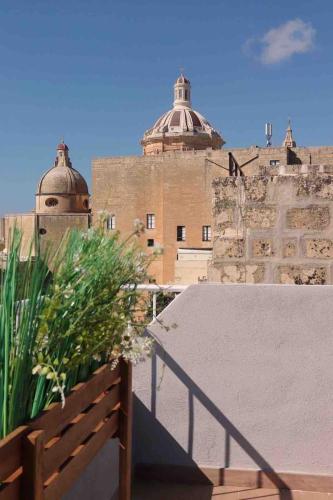 a view of a building from a balcony at Studio Apartment #1 - Rabat in Rabat