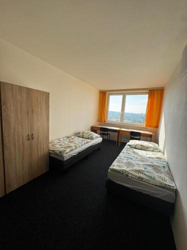 Postel nebo postele na pokoji v ubytování Cooliving
