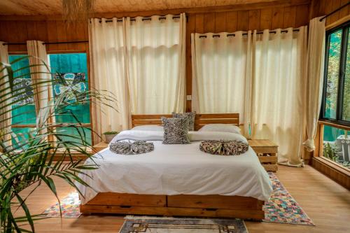 Banana Farm Eco Hostelにあるベッド