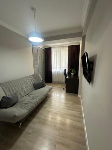 TV i/ili multimedijalni sistem u objektu Apartament